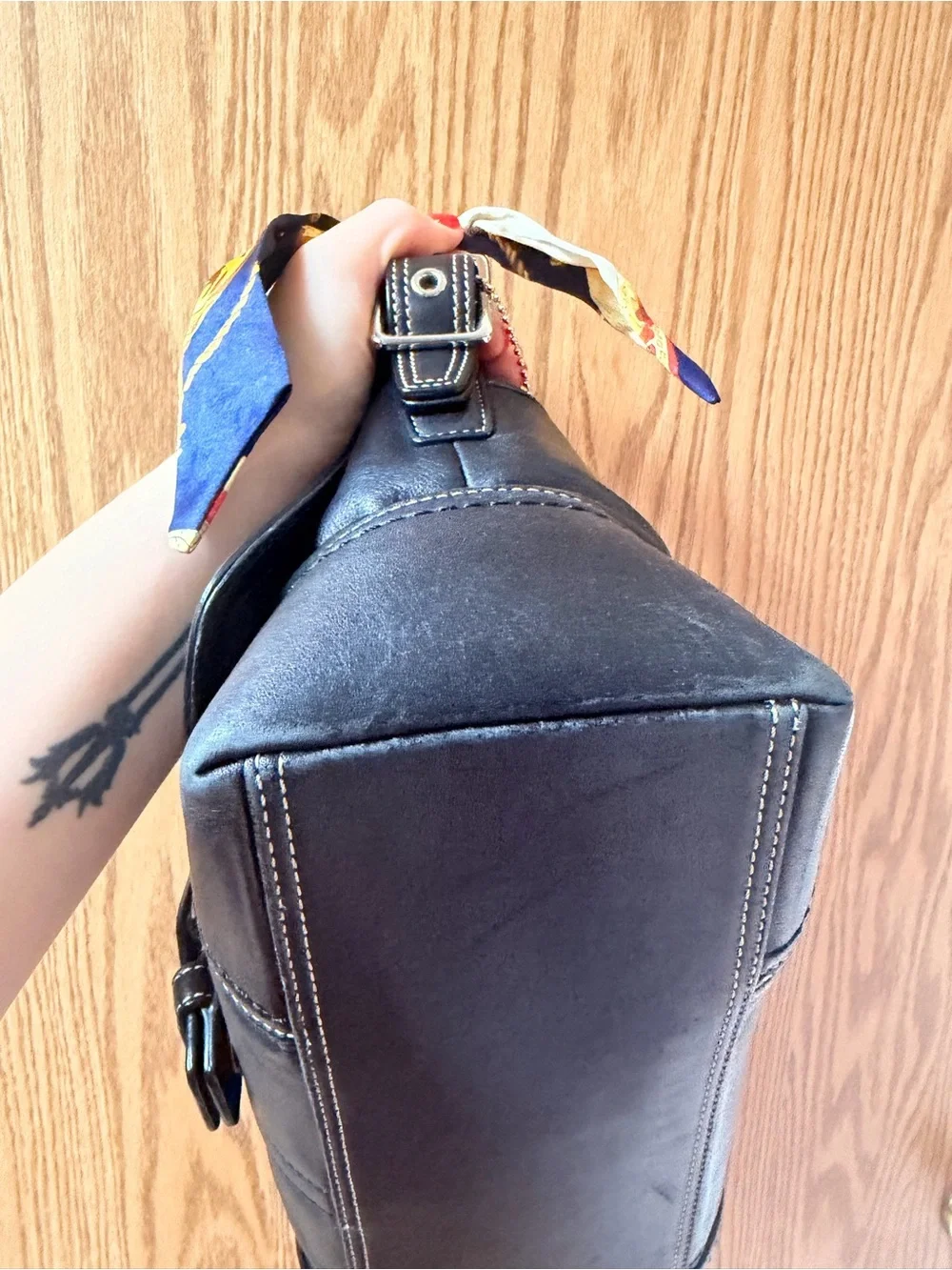 Coach Black Leather Shoulder Bag with Buckle and Navy Scarf Accent